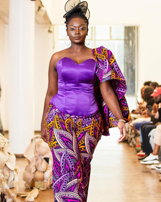 Fashion model wearing a purple outfit with colourful patterned fabric